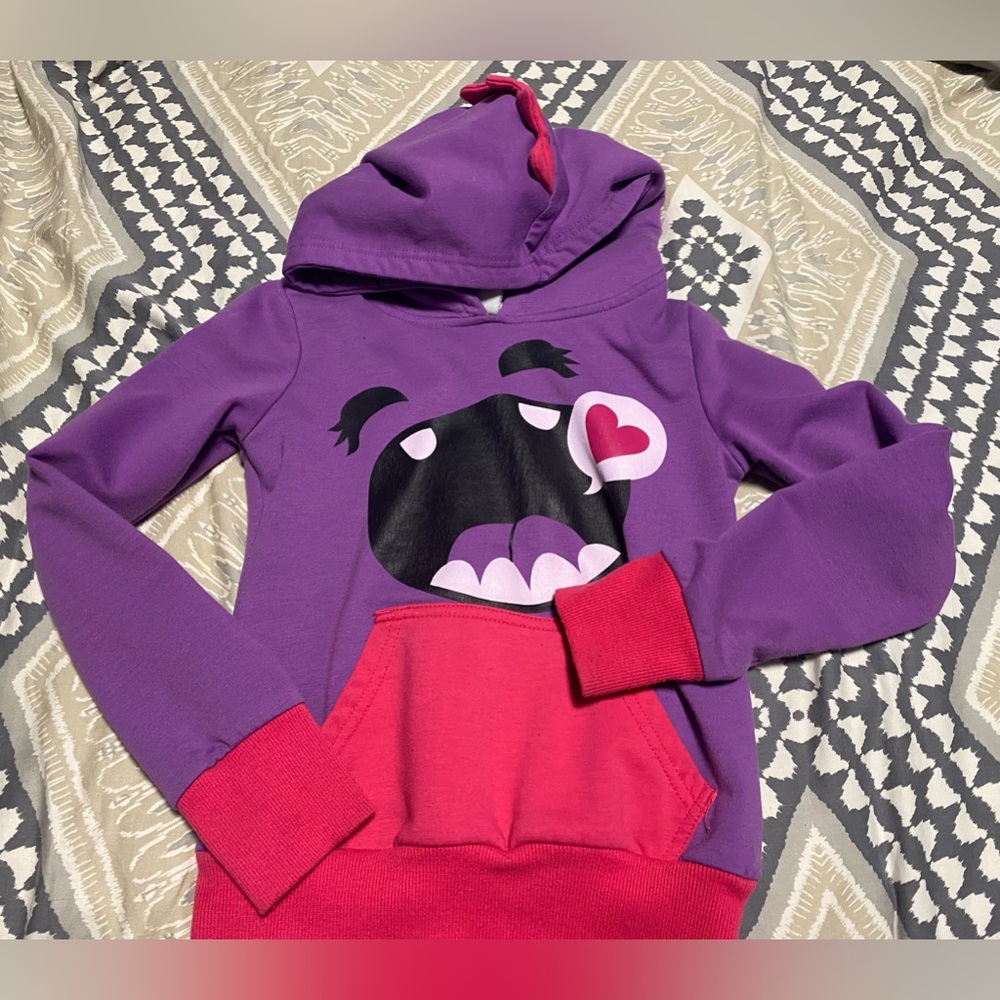 Sweater with dragon look on the hoodie size 7